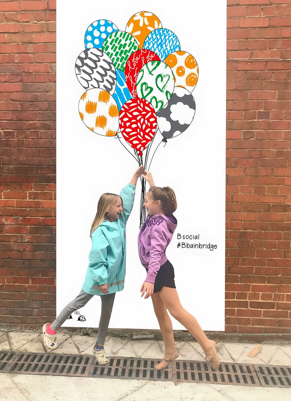 Public art murals encourage engagement in Bainbridge's historic district.