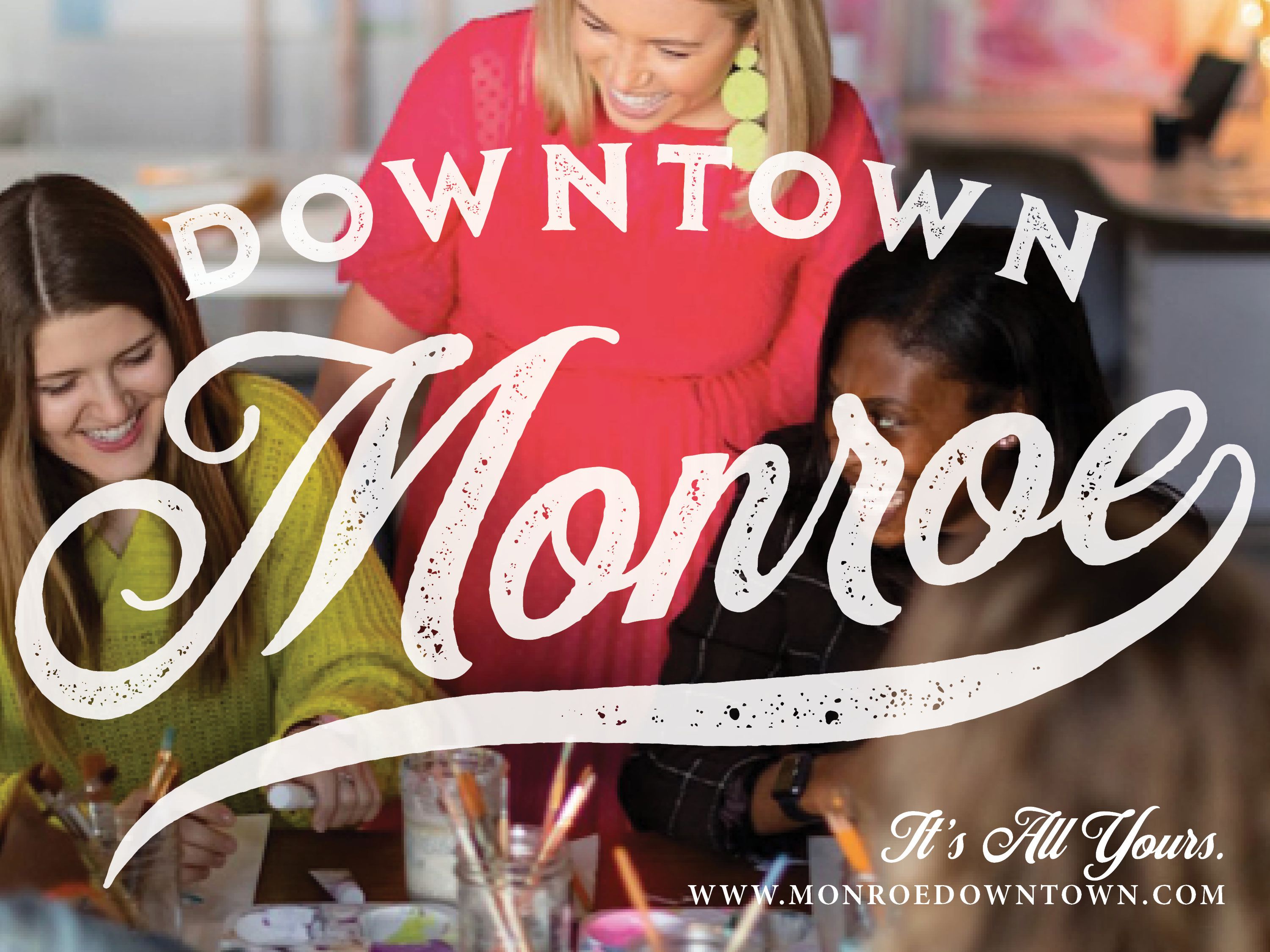 Image of women laughing is overlaid with the Monroe brand for an ad.