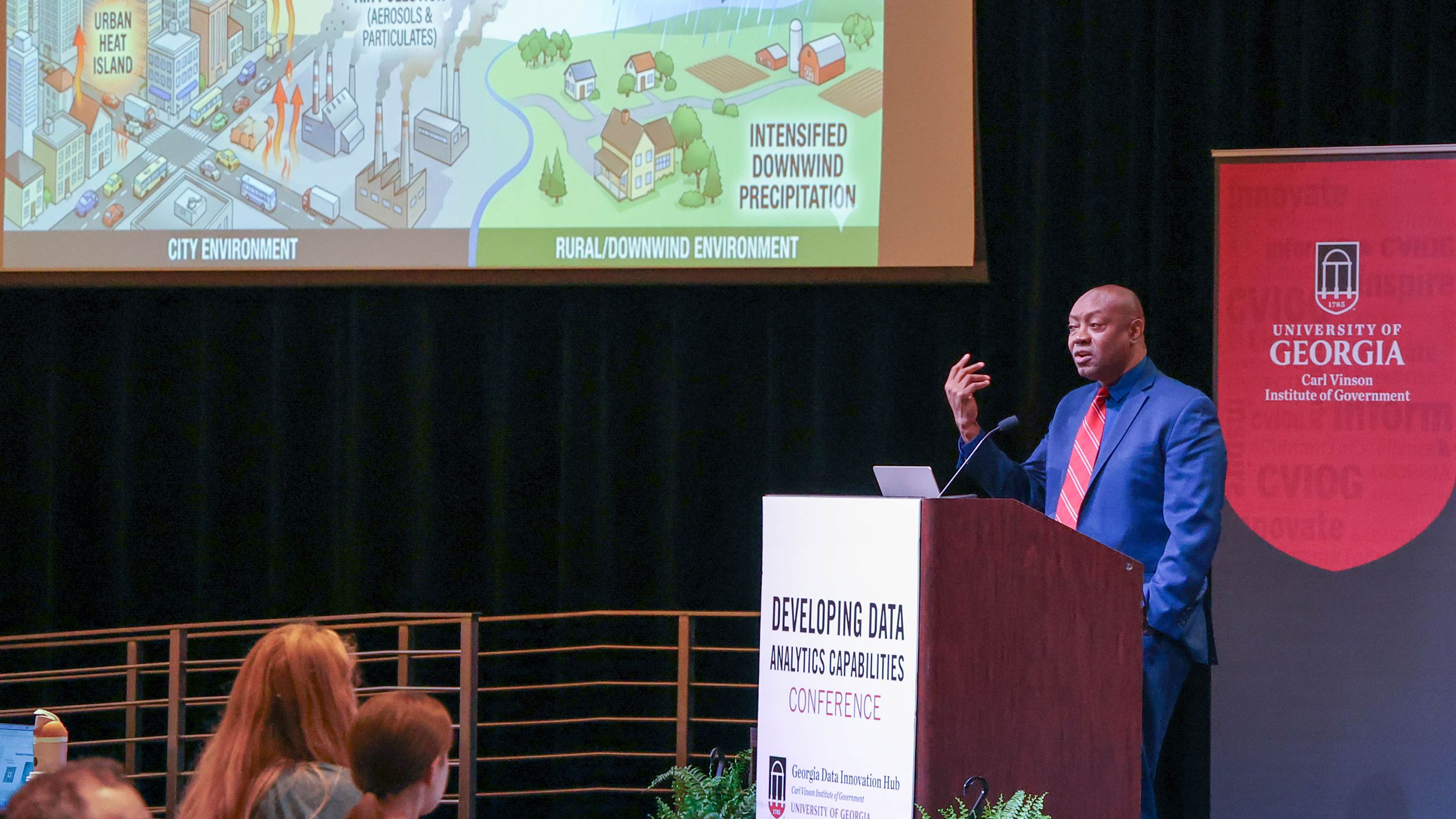 J. Marshall Shepherd of UGA speaks from the main podium at the conference.