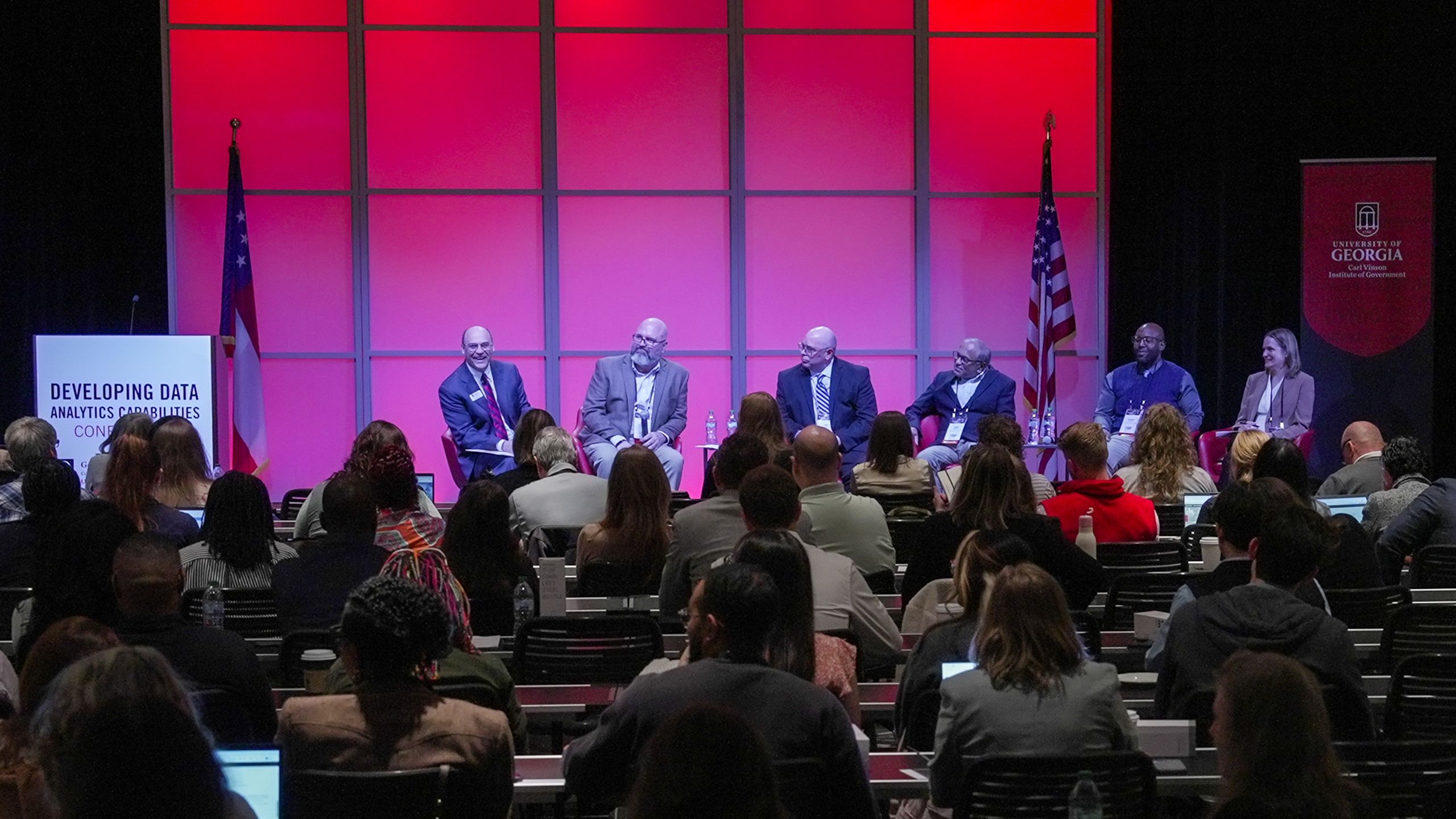 Attendees listen to a panel during the 2026 Developing Data Analytics Capabilities Conference.
